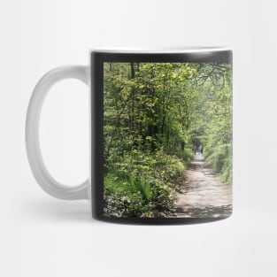 Beautiful young family on a walk in autumn fores Mug